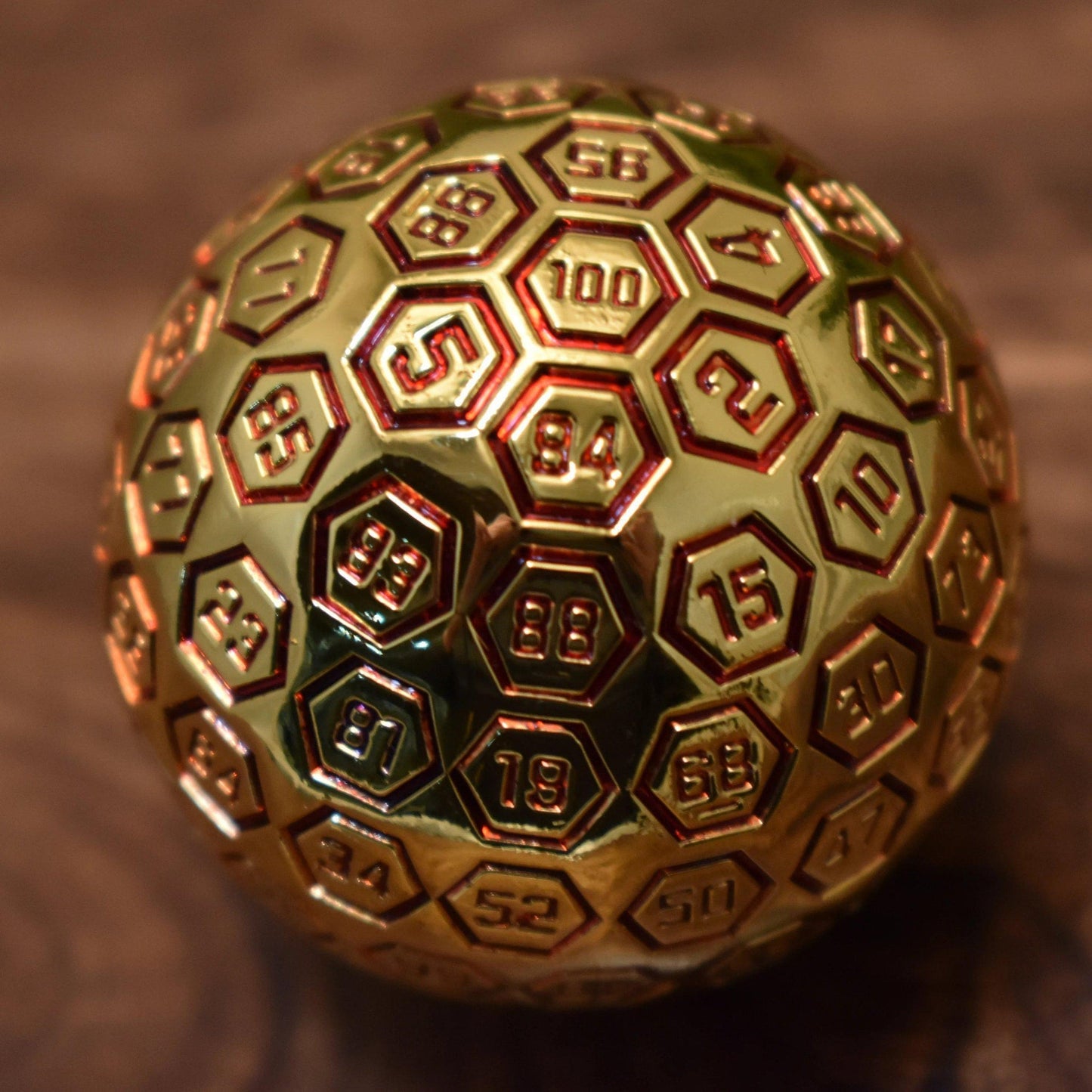 The Orb D100 - Red and Gold Metal Die