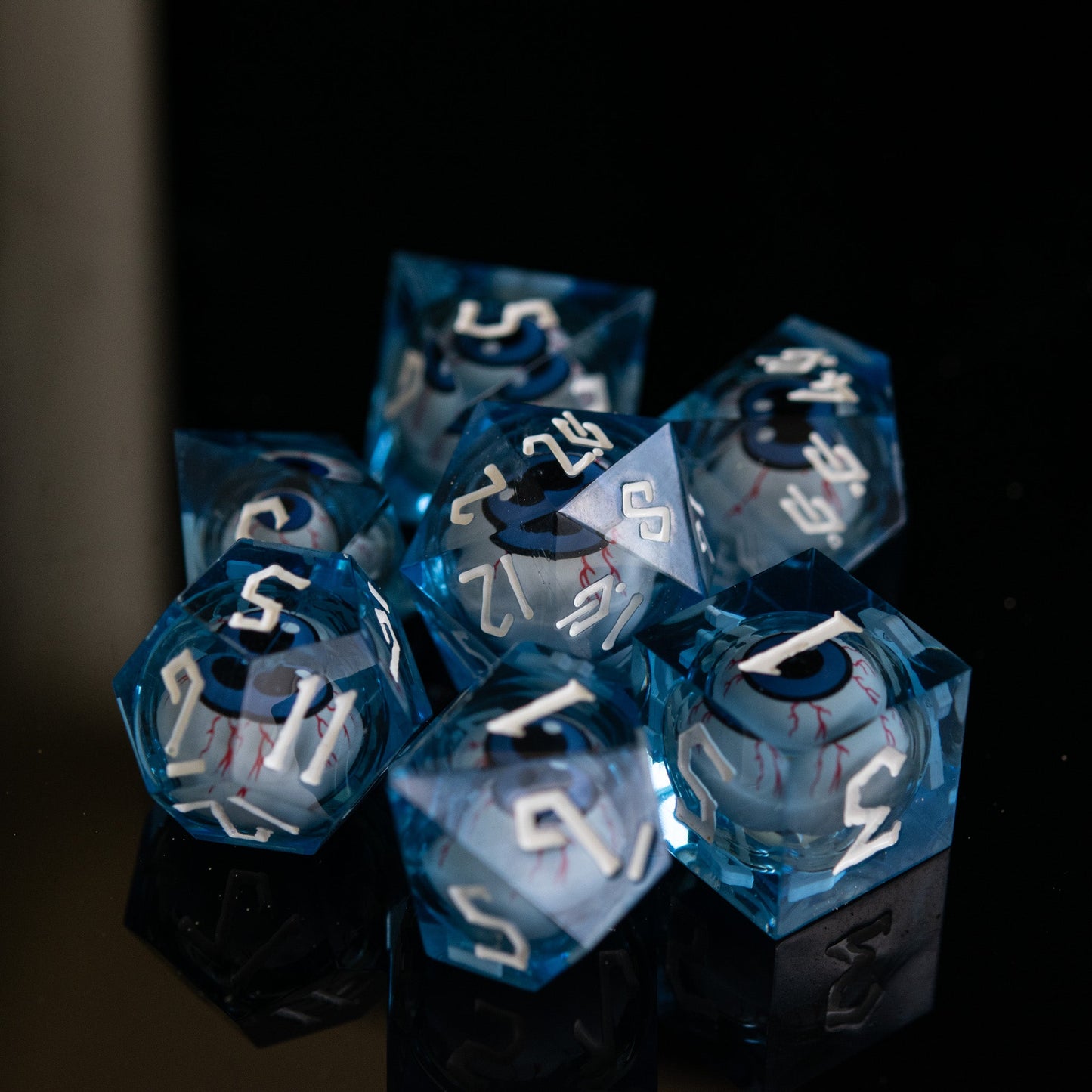 The Watcher: Blue-Eyed Liquid Core Dice Set