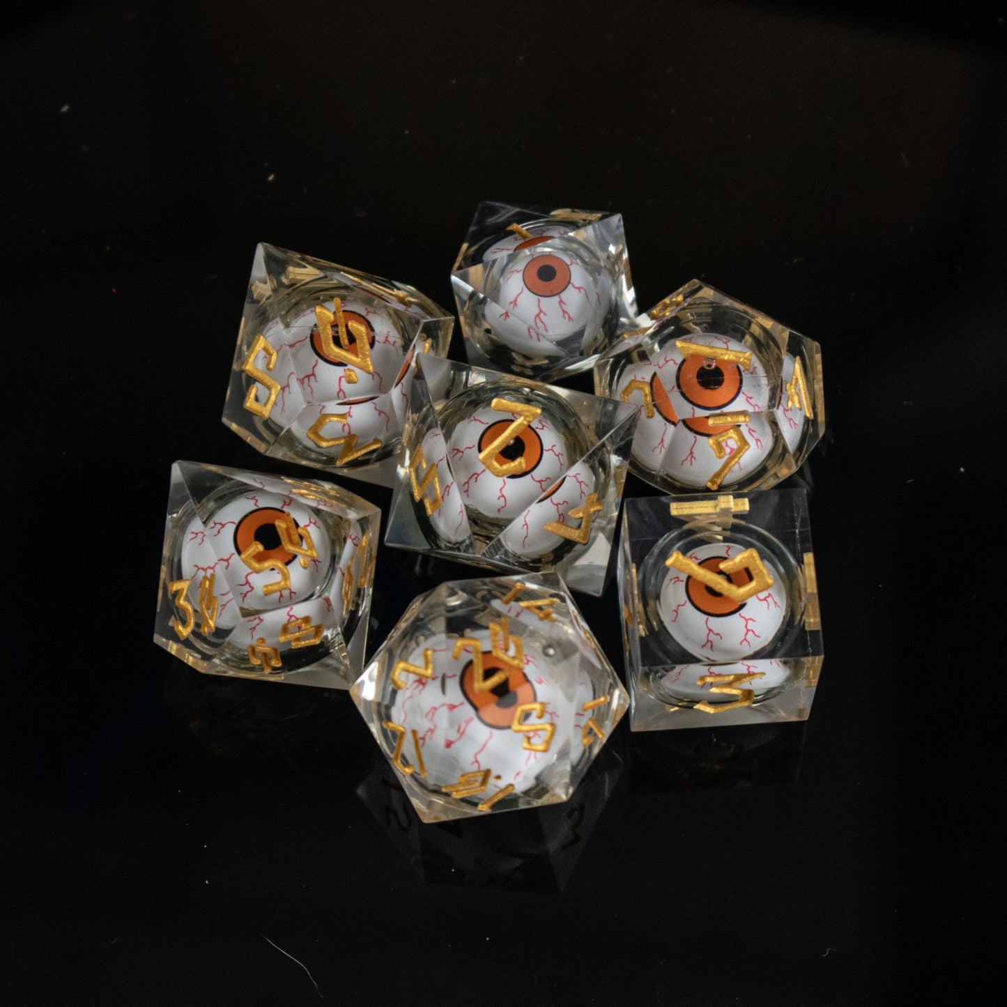 The Watcher: Orange-Eyed Liquid Core Dice Set